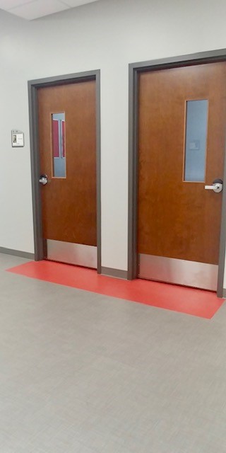 St. Anthony Wayfind flooring near doors