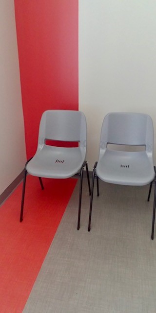 St. Anthony Wayfind flooring next to seating