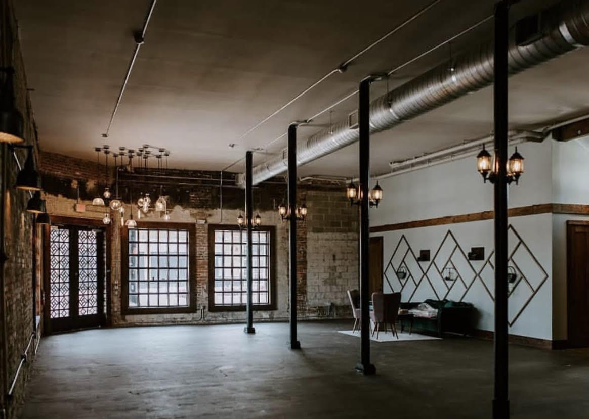 Empty room with lighting and concrete floors